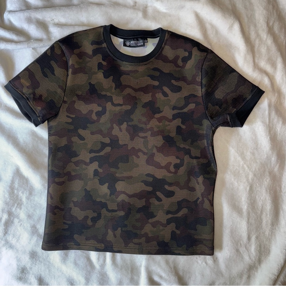 Mostly Heard Rarely Seen Mesh Overlay Tee – Camo Print Short Sleeve Crew Neck
